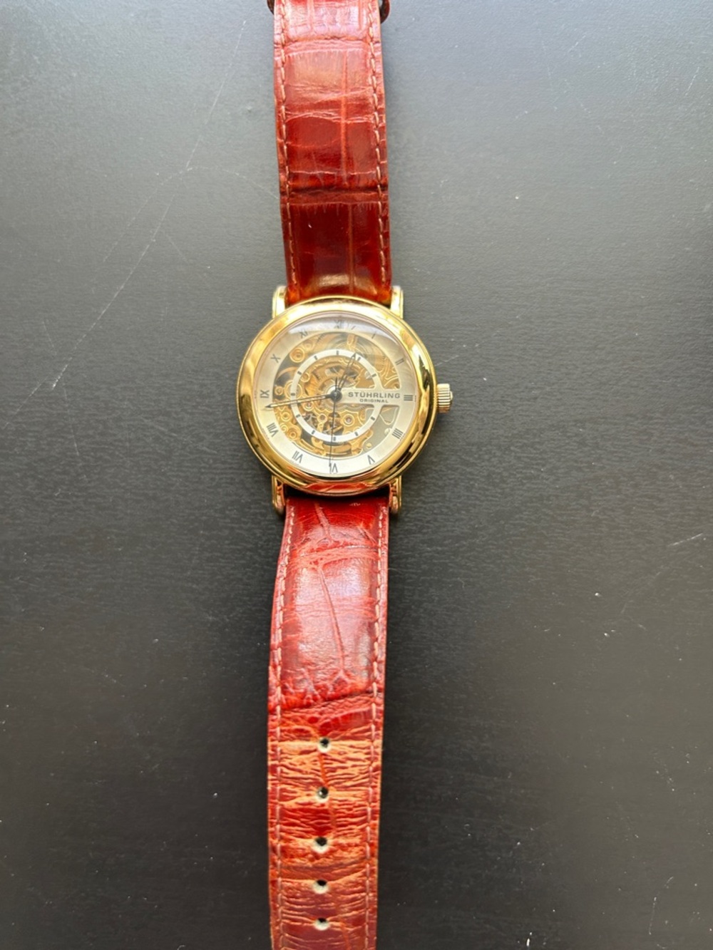 Stührling Skeleton Gold Watch with Red Leather Strap